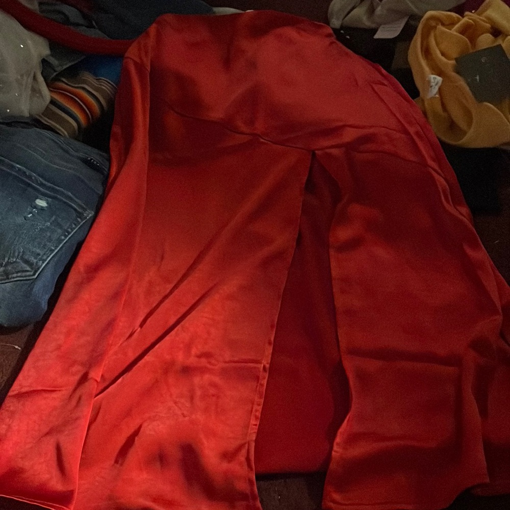 Red floor length slit skirt.